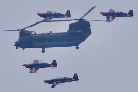 04 June 2022 - 13-24-30
The English Riviera Air Show is on at Torbay this weekend. But the aircraft have to fly in from somewhere and so this Chinook and The Blades passed by Dartmouth
---------------------
RAF Chinook + The Blades aerobatic team